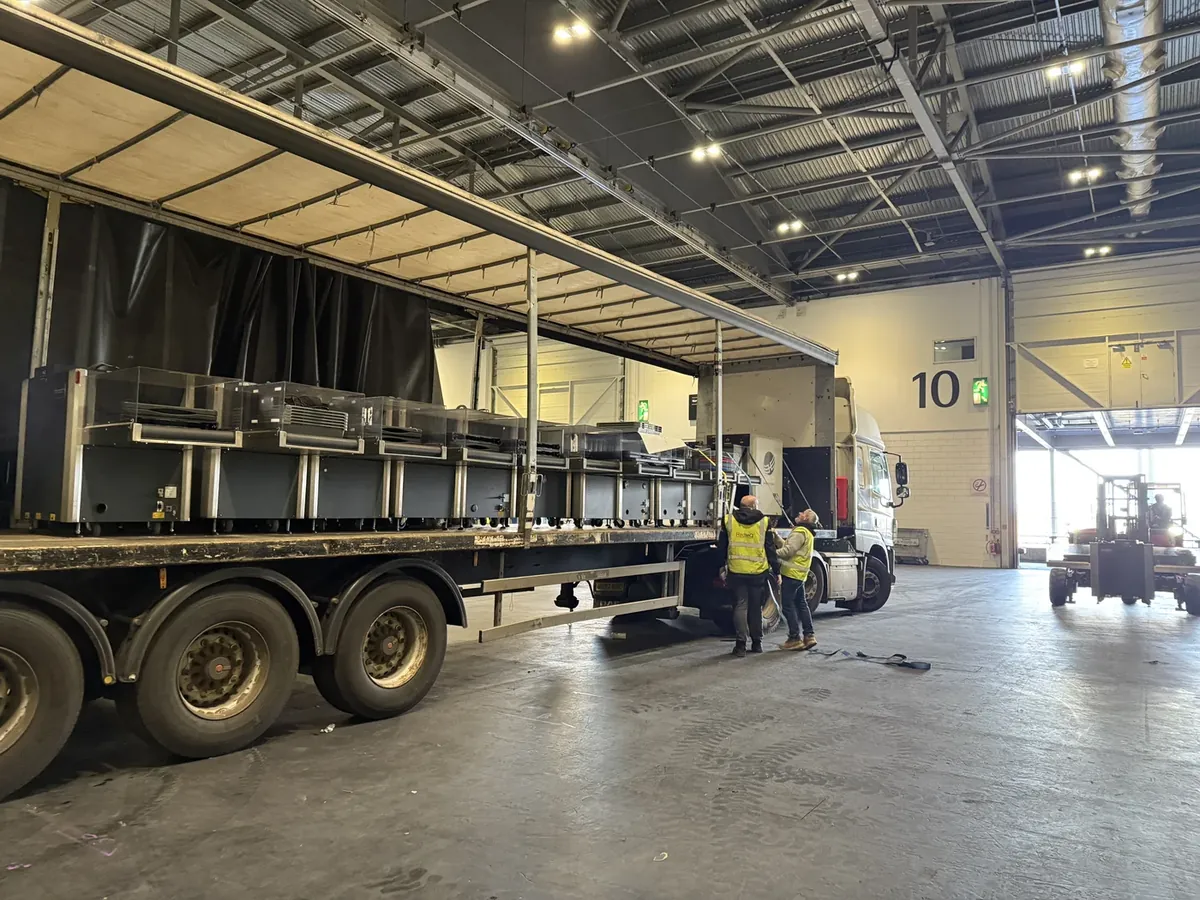 Articulated lorry load of screening equipment arriving for processing