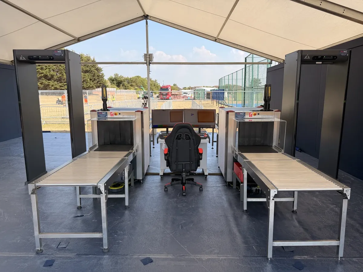 Two-lane AI-assisted X-ray checkpoint at a championship golf tournament