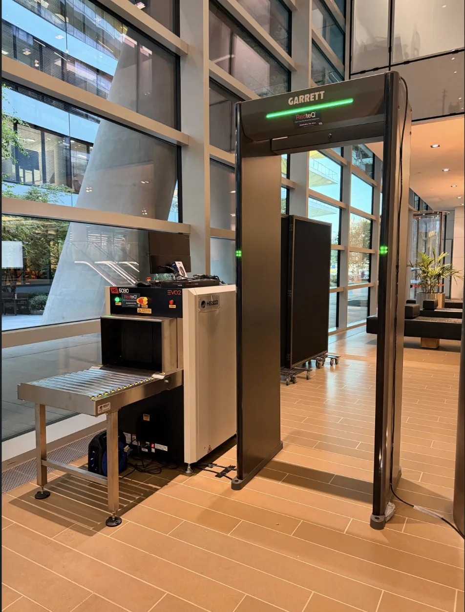 X-ray scanner and walk-through metal detector installed in a central London corporate lobby by RedteQ